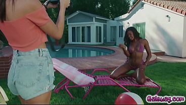 Photographer Natalie Brooks convinces her models Nicole Kitt and Lucy Lotus to kiss for a photo and eventually gets turned on and joins