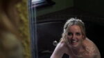 Charlie strips off Marina's soaked clothes and teases her pussy with her tongue before standing over her and pissing all over her face, neck and breasts.