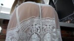 Gorgeous beauty in white lingerie fucks a guy with a huge dick