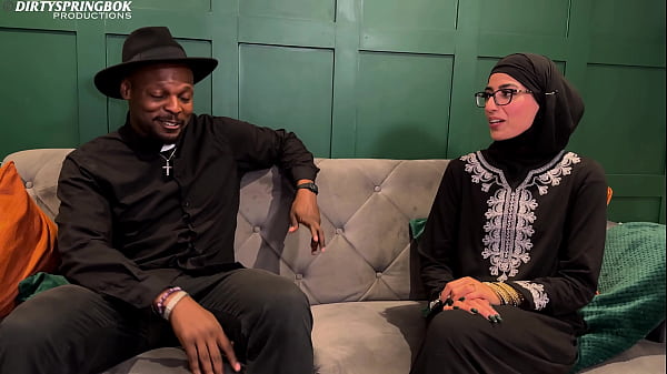 Muslim Aaliyah Yasin is blessed by Father Dimitri’s holy water