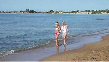 Stepmom and step daughter on a nudist beach